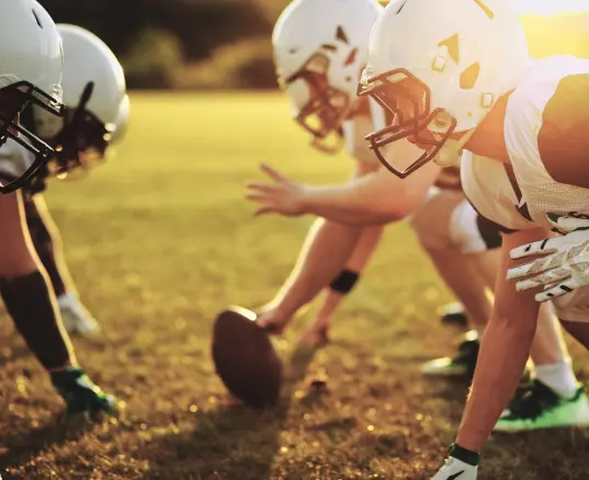 Kids playing football | Alliance Oral & Maxillofacial Surgery